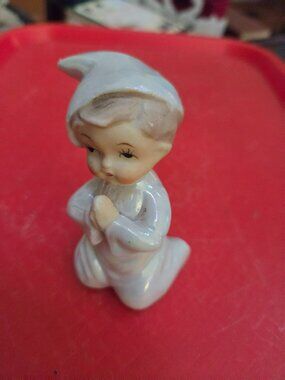 mid century kneeling child in prayer lusterware